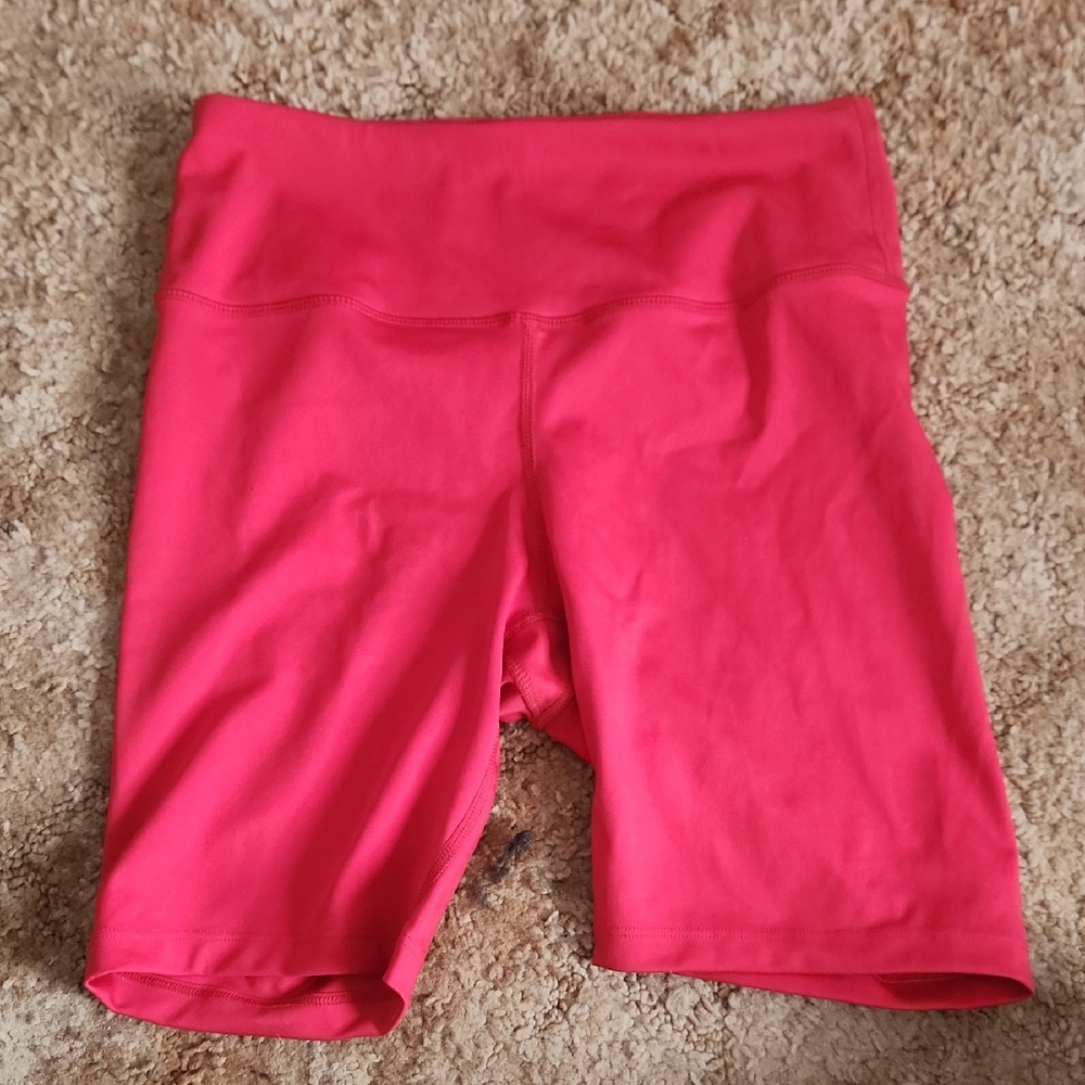 Pink Bike Shorts with Wide Waistband and Moisture-Wicking Fabric